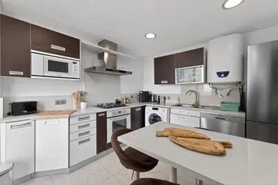 a living room with a view of the ocean at Two Bedroom Apartment with Balcony and Gorgeous view over the Atlantic in Funchal