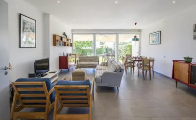 a living room with a couch and chairs and a tv at C12 - Sunshine Apartment in Luz in Luz