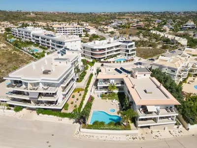 an aerial view of a resort with a swimming pool at Porto de Mós 72 by Destination Algarve in Lagos