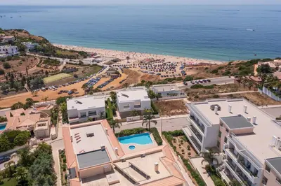 an aerial view of a resort and the ocean at Porto de Mós 72 by Destination Algarve in Lagos