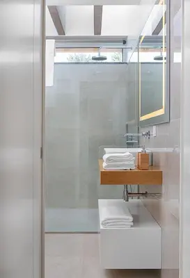a bathroom with a sink and a mirror at Fazendinha by Real Vision in Gaula