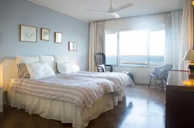 a bedroom with a large bed and a large window at Apartment W Stunning View - MARINA - Free Parking & AC in Funchal