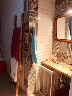 a bathroom with a sink and a mirror at CASA BIKAS in Barão de São Miguel