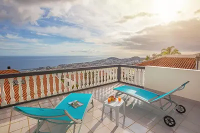 a balcony with a view of the ocean at Villa Vista Mar in Funchal