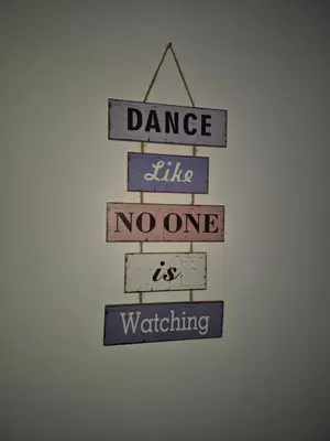 a sign that reads dance little no one is watching at Valley of Nuns Holiday Apartments in Curral das Freiras