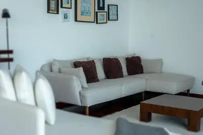 a living room with a couch and a table at Villa Ocean Sight by LovelyStay in Funchal