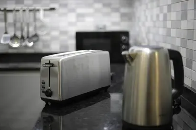a toaster sitting on a counter in a kitchen at Machim House by AnaLodges in Machico