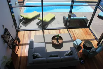 an overhead view of a living room with a couch at Sea House Madeira in Garajau