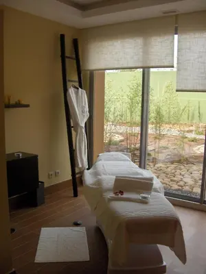 a hospital room with a bed and a window at Pestana Promenade Ocean Resort Hotel in Funchal