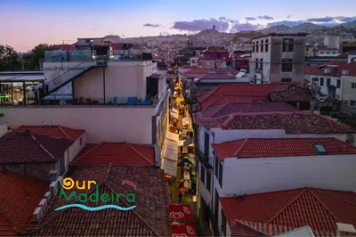 an overhead view of a city with red roofs at OurMadeira - Heart of Old Town II in Funchal