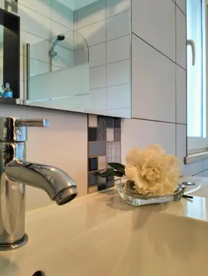 a kitchen counter with a bowl of food on a sink at VILLA ANDORINHA with Private Pool in a quiet area in Aljezur