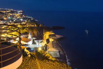 a view of a beach at night at The Best Atlantic Ocean View in Câmara de Lobos