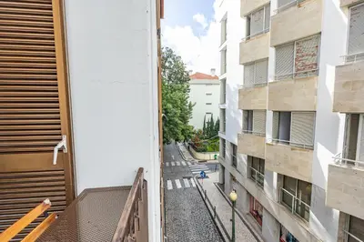 a view of an alley between two buildings at Central Funchal Apartment - GARDEN - Free Parking & AC in Funchal