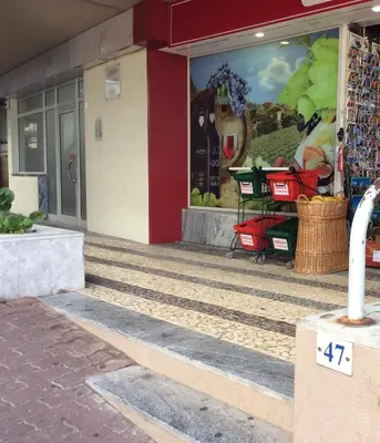 a store front with a sign in front of it at CHARMING LIDO FLAT II in Funchal