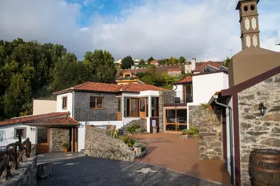 a view of a house with a church at Vila Maria Quinta 13 