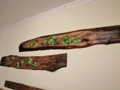 a couple of logs with plants on them at Vila Maria Quinta 13 
