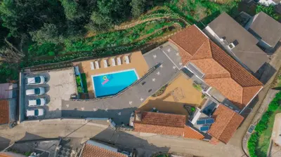 an overhead view of a house with a swimming pool at Vila Maria Quinta 13 