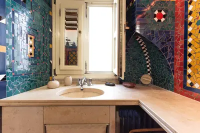 a bathroom with a sink and a window at Beachhouse Algarve, Beach 50m in Salema