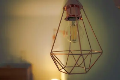 a light fixture hanging from a wall at Casa O Recanto in Raposeira