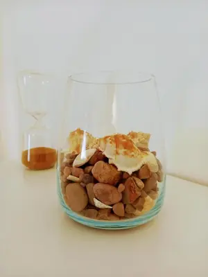 a glass jar filled with rocks and other food at Casa O Recanto in Raposeira