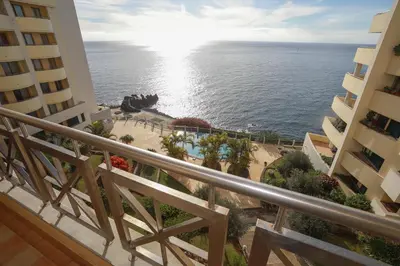 a view of the ocean from the balcony of a building at Marvelous Ocean View in Funchal