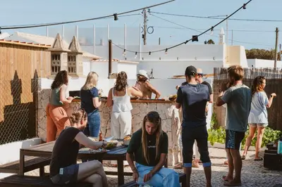 an aerial view of a cliff next to the ocean at Aldeia Caiçara Surf House in Sagres
