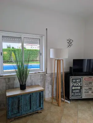 a room with two bunk beds and a window at Apartamento Mahalo in Sagres
