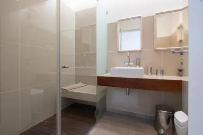 a bathroom with a sink and a shower at Bela Vista da Luz 17 by Destination Algarve in Luz