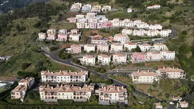 an aerial view of houses on a hill at Sea and Sun 4 You - Palheiro Village in Funchal
