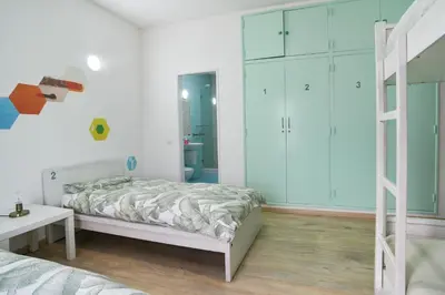 a bedroom with a bed and a bunk bed at Sagres Natura in Sagres