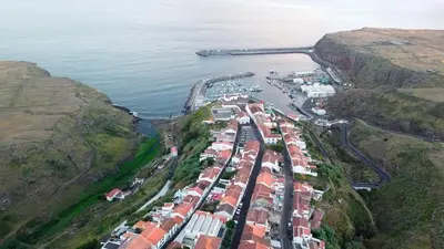 an aerial view of a town on the side of a mountain at Apartamentos Lisboa in Vila do Porto