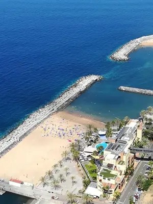 an aerial view of a beach and the ocean at Zeza´s Garden in Calheta