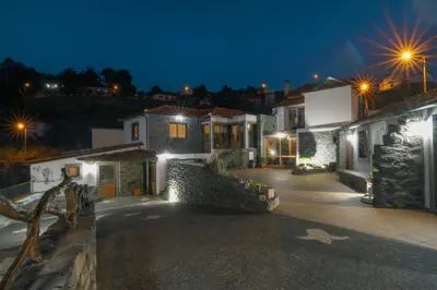 a view of a house at night with lights at Vila Maria Quinta 5 