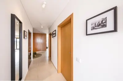 a hallway of a house with a picture on the wall at maresoul - Ferienapartment mar in Raposeira