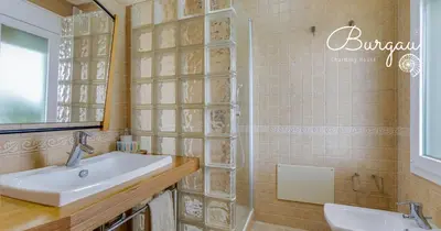 a bathroom with a sink and a shower at Burgau Charming House Villa in Burgau