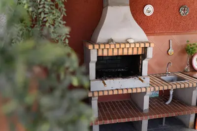 a toy kitchen with a stove and a sink at O Meu Sonho in Calheta