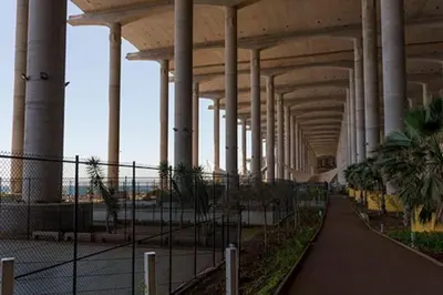 a large building with columns and trees in it at The Artist Villa in Santa Cruz