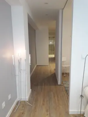 an empty hallway with white walls and wood floors at OLD TOWN Apartment W Interior Terrace - Barreirinha in Funchal
