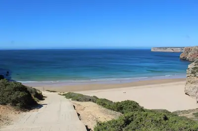 a view of a beach from a cliff at Beach Front Apartment 2 in Sagres