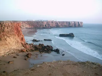 a view of a beach with rocks and the ocean at Casa do Tonel in Sagres