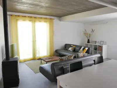 a living room with a couch and a table at Casa na Carrapateira, Aljezur in Carrapateira