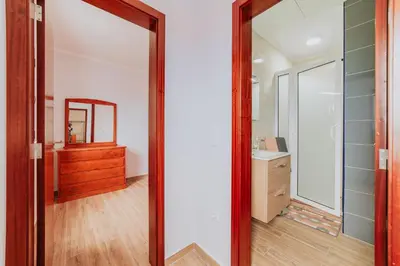 a bathroom with a sink and a shower at Casa da Morena by Amazing Madeira in Santa Cruz