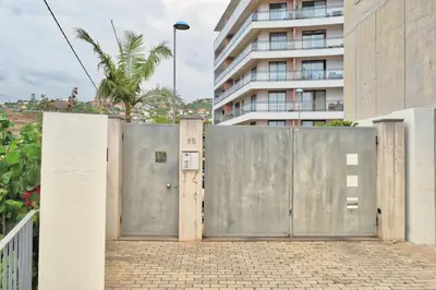 a pair of gates in front of a building at Levada dos Piornais, a Home in Madeira in Funchal
