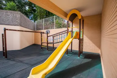 a basketball hoop on a balcony with a pool at FLH Funchal Modern Apartment with Pool in Funchal