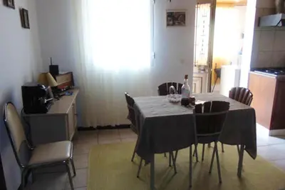 a kitchen with a sink and aaucet at Charming house in Machico with mountain view and garden in Machico