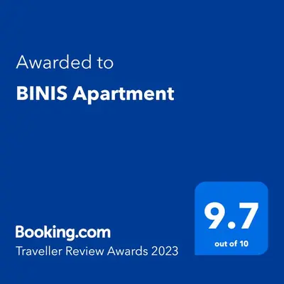 a blue screen with the text awarded to bins appointment at BINIS Apartment in Funchal
