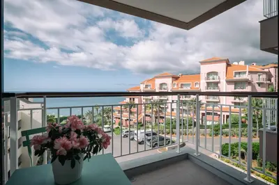 a balcony with a view of a building at BINIS Apartment in Funchal