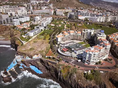 an aerial view of a city next to the ocean at Centromar Residence Ocean View By Atlantic Holiday in Funchal