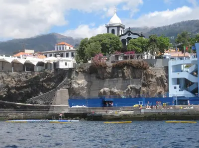 a view of a city from the water at Vitorina Corte Guesthouse in Funchal