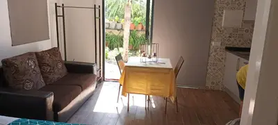 a living room with a couch and a table at Victoria 1942 in Funchal